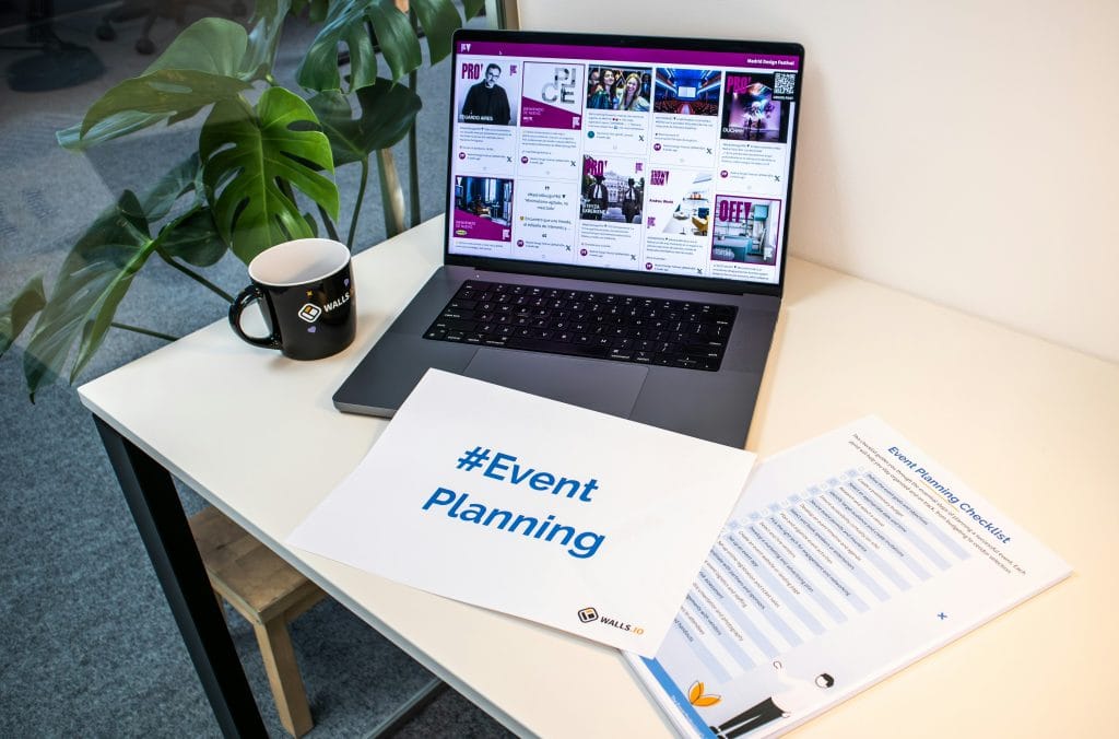 Laptop and printed event planning checklist on a desk, the kind of prep work that goes into deciding to host event Vancouver style