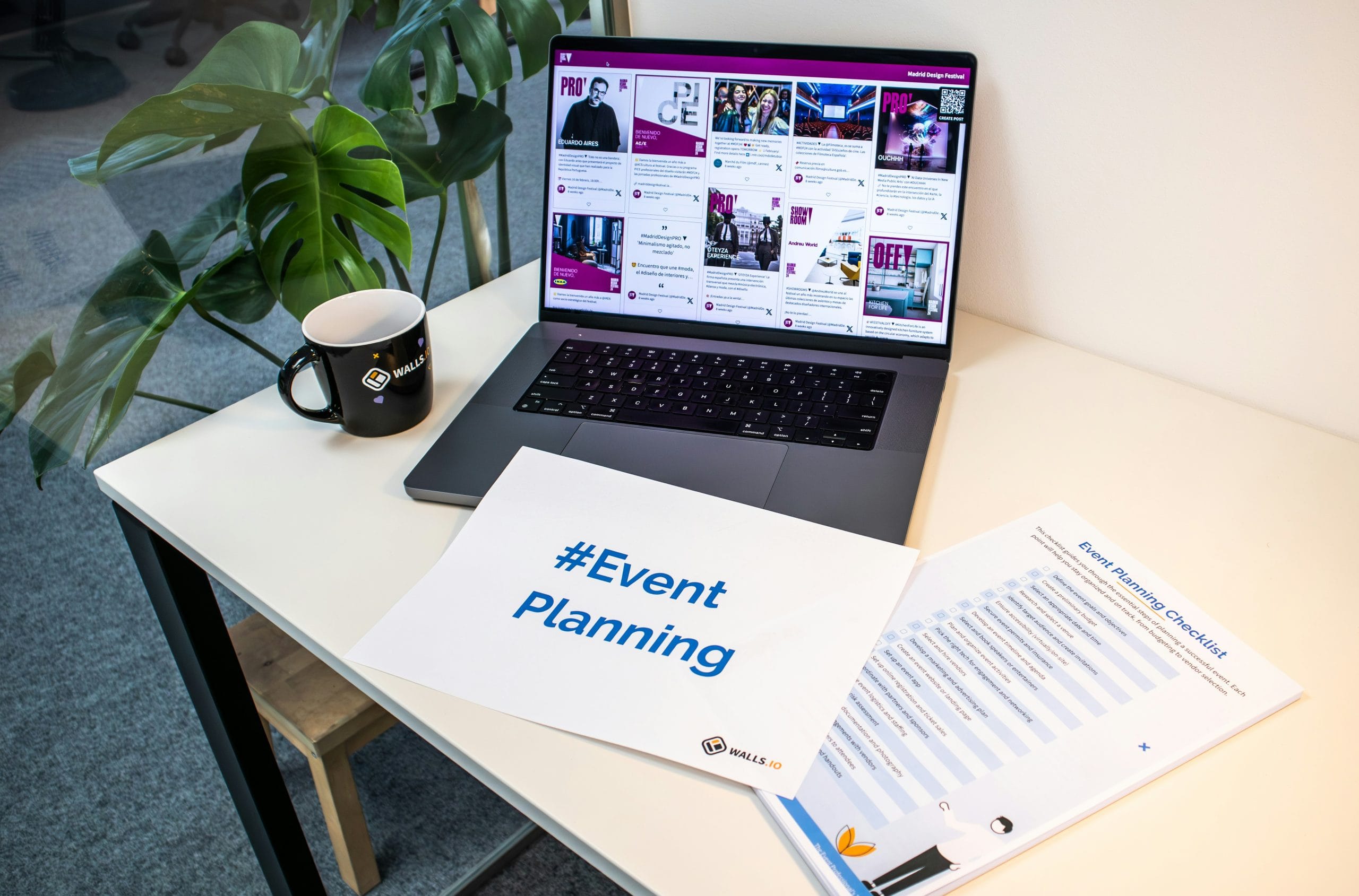 Laptop and printed event planning checklist on a desk, the kind of prep work that goes into deciding to host event Vancouver style